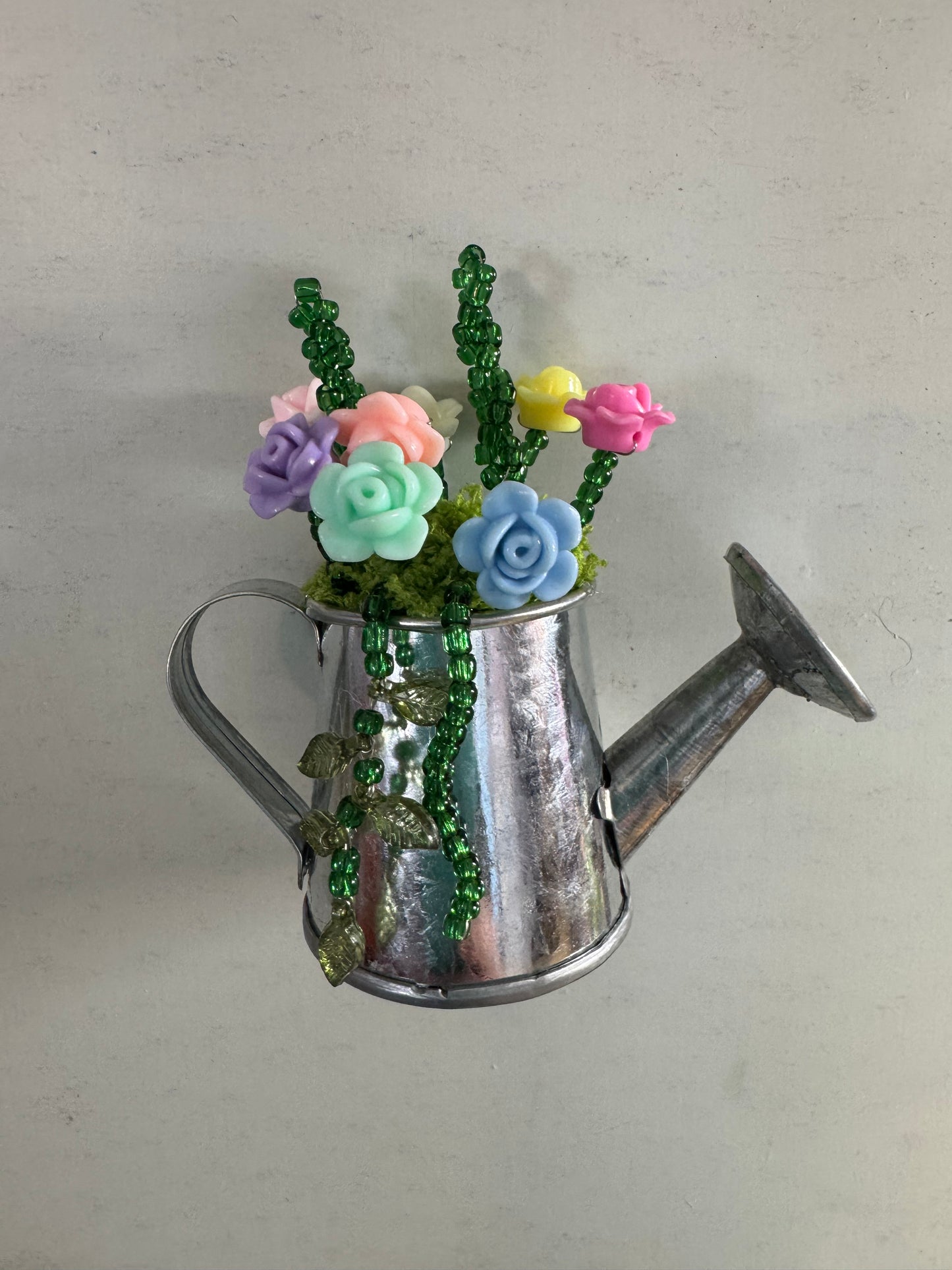 20. Watering can bouquet magnet