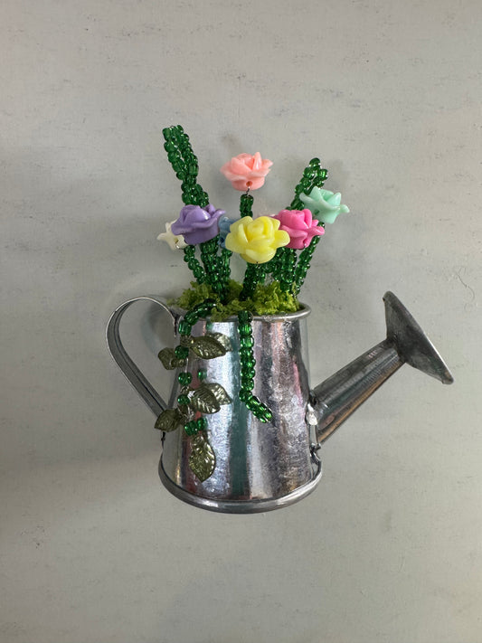 18. Watering can bouquet magnet