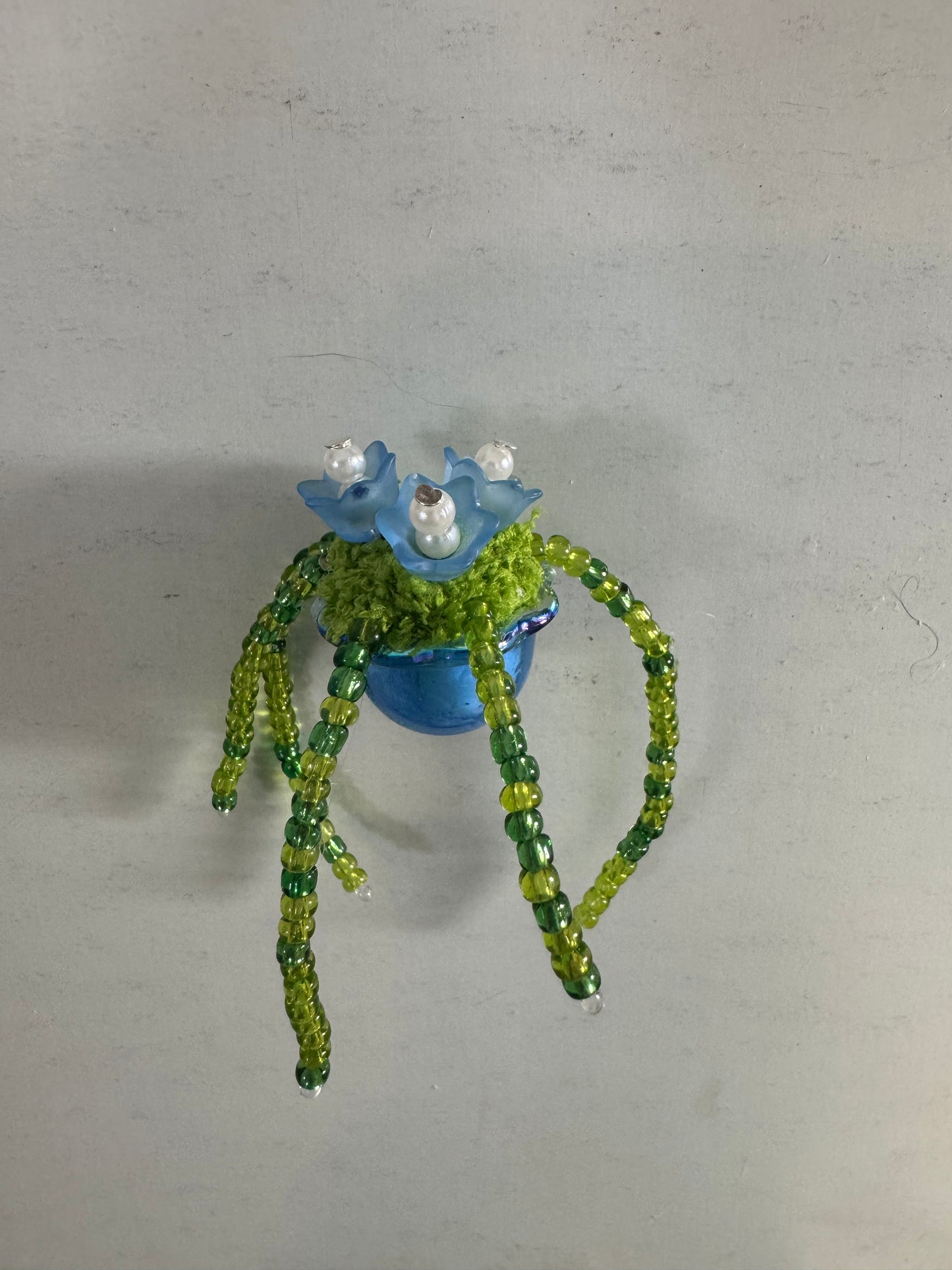 24. Beaded plant magnets